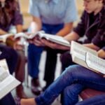 small group of people doing a bible study