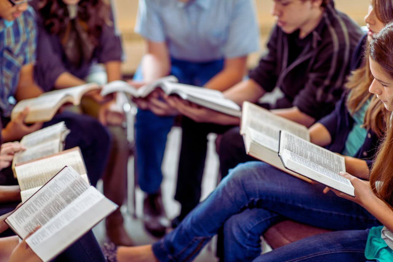 small group of people doing a bible study
