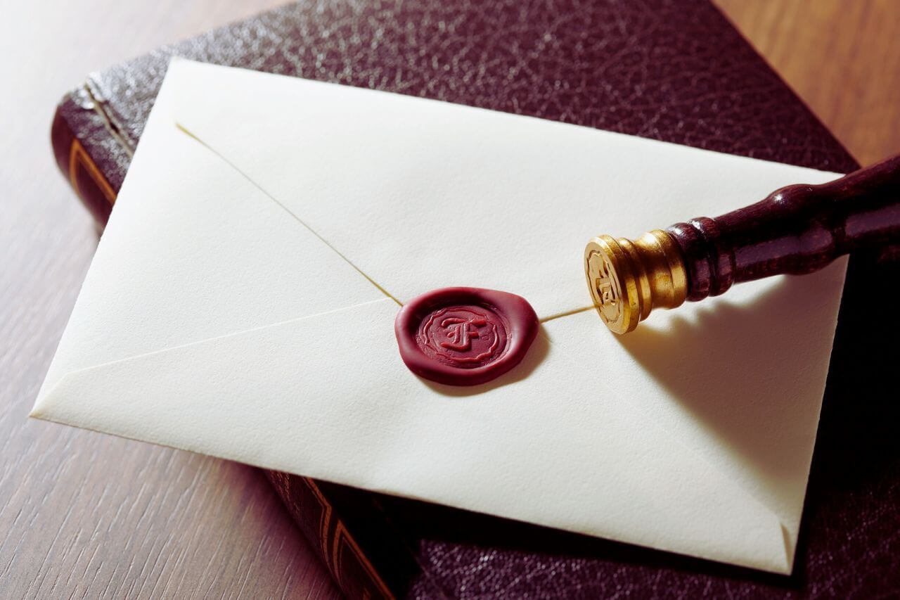 sealed letter with stamped wax seal