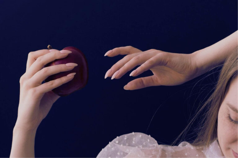 woman holding an apple