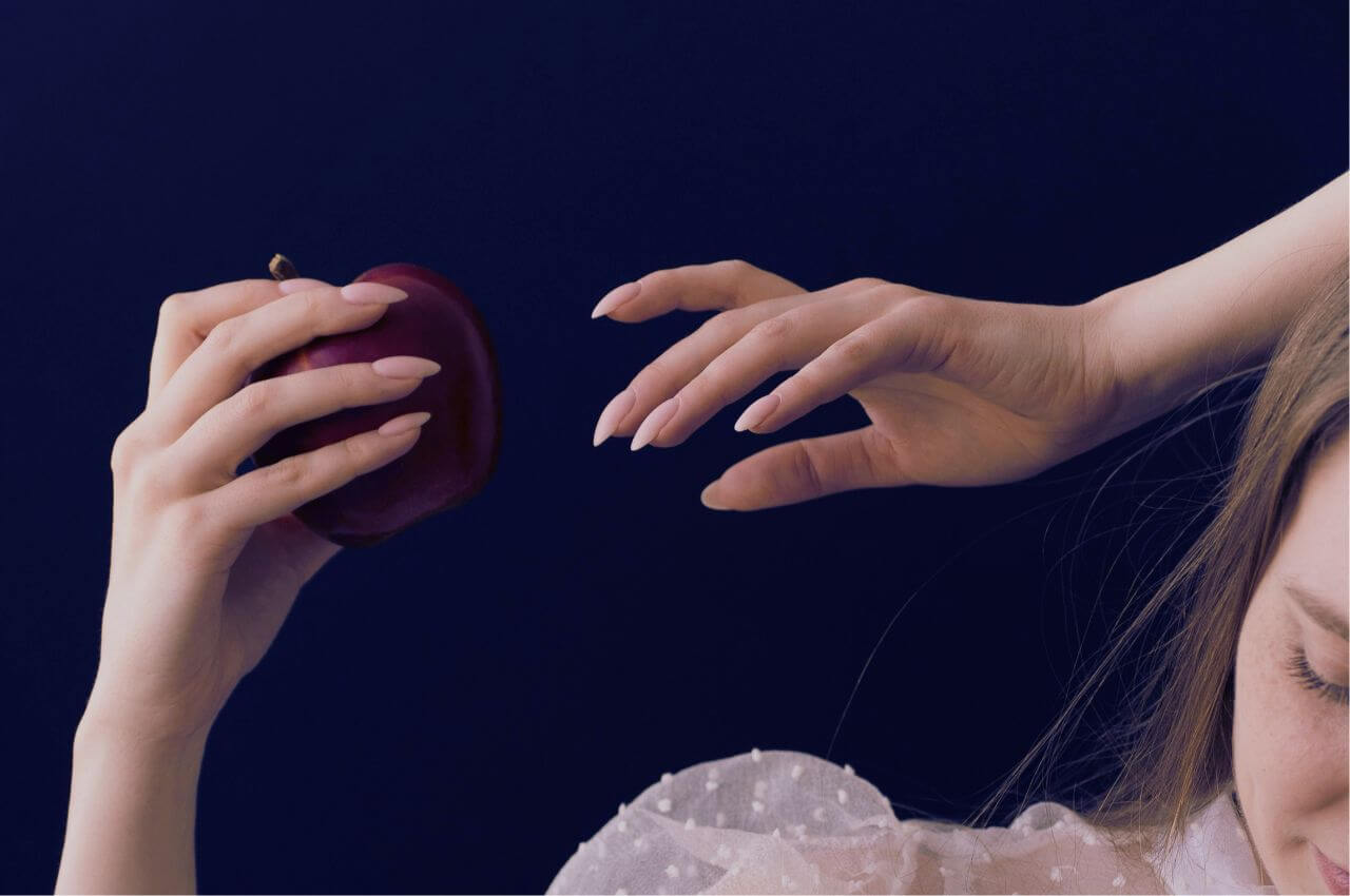 woman holding an apple